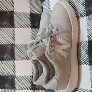 New Balance Over-Cast light grey and white sneakers